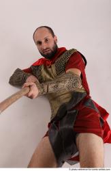 MARCUS LAYING POSE WITH SPEAR